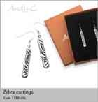 Andy C Earrings